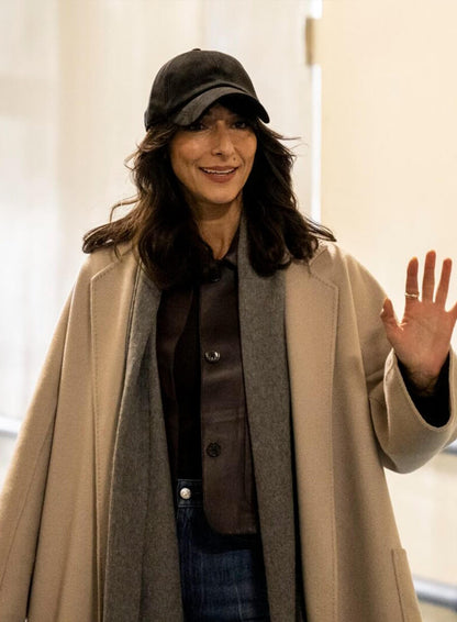 Nikki Reynard CIA 2026 Beige Coat