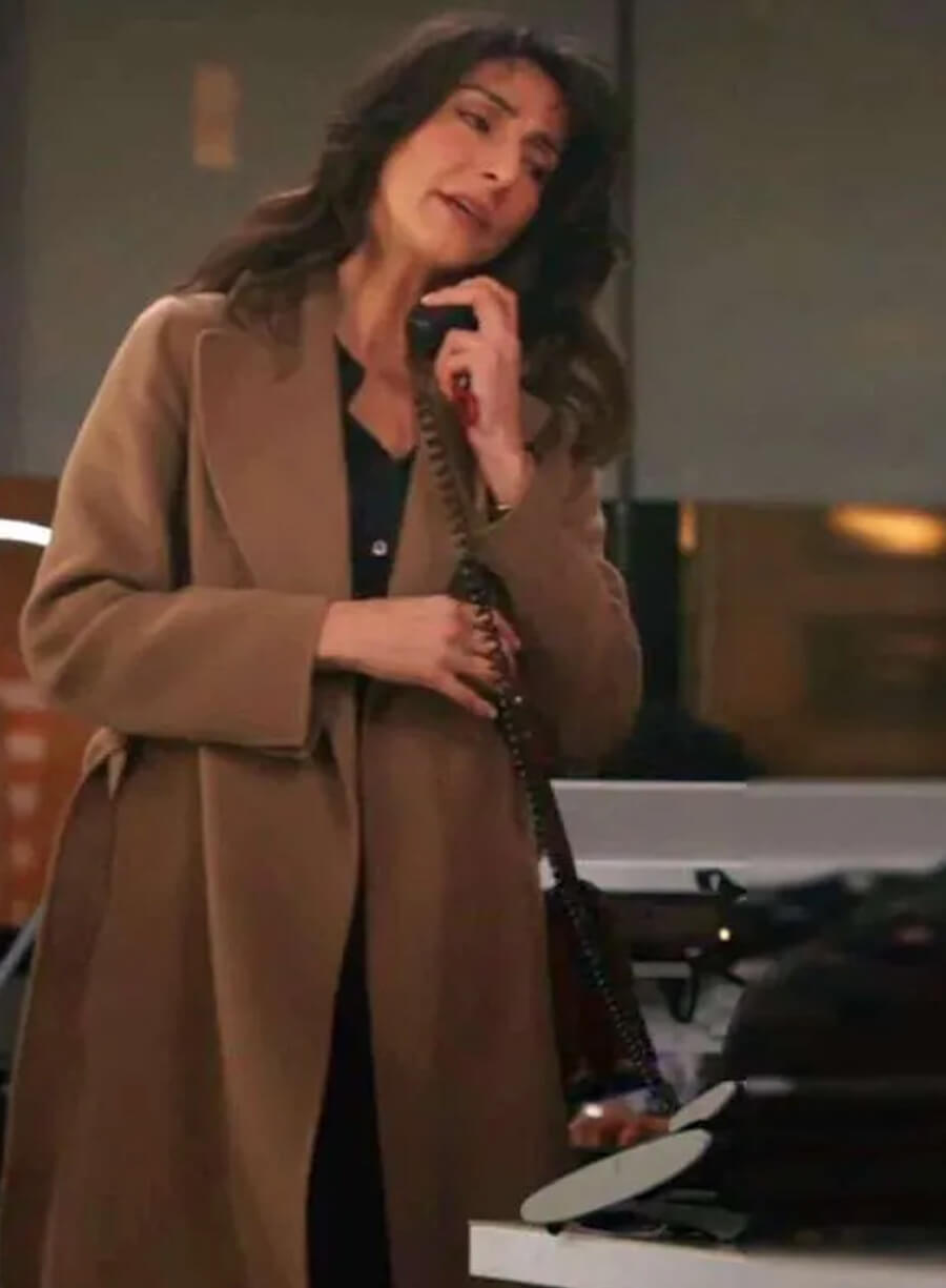 Nikki Reynard CIA 2026 Brown Coat