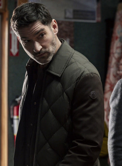 Tom Ellis CIA 2026 Colin Glass Green Puffer Jacket