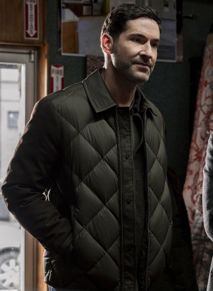 Tom Ellis CIA 2026 Colin Glass Green Puffer Jacket